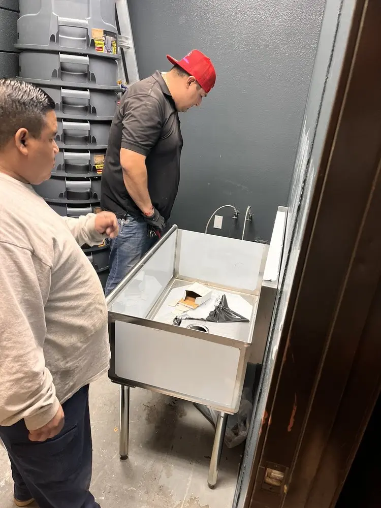 Commercial plumbing and sink installation in Germany